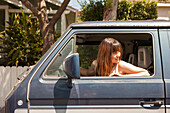 Young woman in a van