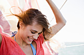 Young woman on yacht
