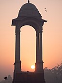 Historic chhattri at sunrise at India Gate in New Delhi, India.