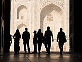 Silhouette of tourists at Taj Mahal in Agra, Uttar Pradesh, India.