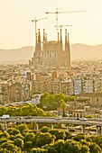 Cityscape. Plaça de les Glòries and Sagrada Familia church. The bottom: Collserola mountain. Barcelona, Catalonia, Spain.