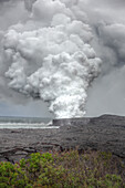 Steam From The Lava Flow Of Kilauea Flowing Into The Ocean On The Big Island Of Hawaii