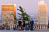 Young Men Hanging Around The Lookout And Buildings At Sunset, Montreal, Quebec
