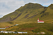 'Isolated Church On Hill Overlooking The Village Of Vik; Vik, Vestur-Skaftafellssysla, Iceland'