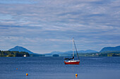 'Sailboat On Lac Memphremagog In Early Morning With Mont Owls Head In Background; Magog, Quebec, Canada'