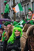 Spectators wearing the green colour of the irish clover, saint patrick's day, dublin, ireland