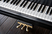 Keys and Foot Pedals of Grand Piano, High Angle View