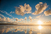 Cloud reflections at Constantine Bay at sunset, Cornwall, England, United Kingdom, Europe