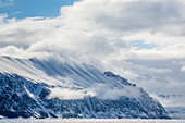 Dramatic skies in Signehamna, Krossfjorden, Spitsbergen, Svalbard, Norway, Scandinavia, Europe