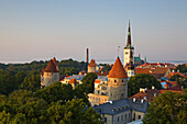 Elevated view of lower Old Town with Oleviste Church in the background, UNESCO World Heritage Site, Tallinn, Estonia, Europe