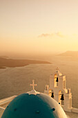 St. Gerasimos Church with blue dome at sunset, Firostefani, Santorini, Cyclades, Aegean Sea, Greek Islands, Greece, Europe