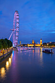River Thames, Houses of Parliament and London Eye at dusk, London, England, United Kingdom, Europe