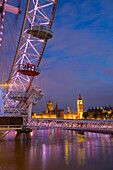 River Thames, Houses of Parliament and London Eye at dusk, London, England, United Kingdom, Europe