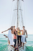 Caucasian friends on sailboat, Cape Town, Western Cape, South Africa