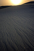 GYPSUM SAND DUNE AT SUNSET, WHITE SANDS NATIONAL MONUMENT, CHIHUAHUAN DESERT, NEW MEXICO, USA