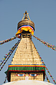 'The Buddhist stupa of Boudhanath dominates the skyline and is one of the largest in the world; Boudhanath, Nepal'