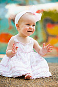 'Baby Girl Smiling And Waving; Nashville, Tennessee, Usa'