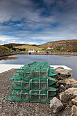 'Fishing Traps Sitting On The Shore; Isle Of Barra, Scotland'