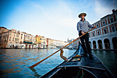 'A Gondolier Rowing A Gondola; Venice, Venezia, Italy'