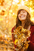 'Young Woman; Young Woman Holding Autumn Leaves'