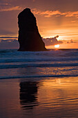 'Silhouette Of A Rock Formation At Sunset; Cannon Beach, Oregon, United States of America'