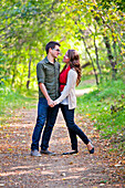 'Newlywed Couple Spending Time Together In A Park In Autumn; Edmonton, Alberta, Canada'
