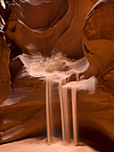 'Sand Flowing Over The Sandstone Ledges; Arizona, United States of America'