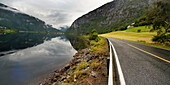 'A Paved Road Along Granvinsvatnet Lake; Granvin, Hordaland, Norway'