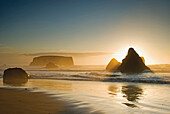 'Sunset behind offshore rocks;Bandon oregon united states of america'