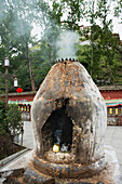 'Smoke coming from a round stone structure at potala palace;Lhasa xizang china'