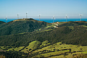 'Wind turbines in a row along the water's edge;Tarifa cadiz andalusia spain'