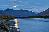 'Moonlight reflected into noatak river in the brooks range gates of the arctic national park northwestern alaska;Alaska united states of america'