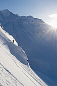 'Backcountry Skiing In The Chugach Mountains In Late Winter; Southcentral Alaska, United States Of America'