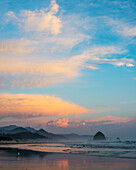 'The Oregon coastline at dusk; Cannon Beach, Oregon, United States of America'