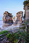 'Monolith at twilight, Anse des Bonnes Femmes at Ile Niapiskau, Mingan Archipelago National Park Reserve of Canada, Cote-Nord, Duplessis region; Quebec, Canada'
