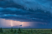 'Double lightning strike during a thunderstorm over Hudson bay; Manitoba, Canada'
