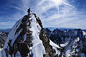 Mountaineer on the westridge of Berre des Ecrins, Dauphine, France
