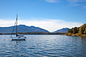 Sailing boat near Gstadt, Chiemsee, Chiemgau region, Bavaria, Germany