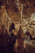 Giant Stalagmites and Stalactites in a dripstone cave, Sonnenbuehl, Swabian Alp, Baden-Wuerttemberg, Germany