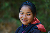 Young Eng, Ann woman in traditional clothes near Kyaing Tong, Kentung, Shan State, Myanmar, Burma