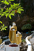 Standing Buddhas on the steps to Bayin Nyi Cave near Hpa-An, Karin State, Myanmar, Burma, Asia