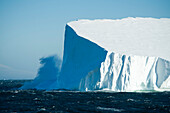 A giant wave crashing against an iceberg in an extremely rough Southern Ocean, Ross Sea, Antarctica