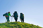 Three hikers, Blauberge, Bavarian Prealps, Upper Bavaria, Bavaria, Germany