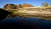 Bungle Bungle range mirrored in a small lake, Purnululu National Park, Western Australia, Australia