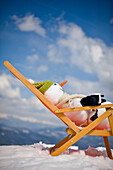 Snowman in a deckchair, Styria, Austria
