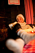 Young woman reading a book, Styria, Austria