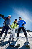 Three skiers, Fageralm, Salzburg, Austria