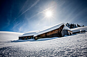 Snow-covered lodges, Alp, Salzburg, Austria