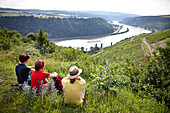 Hikers enjoying view over Rhine Gorge, Sankt Goarshausen, Rhineland-Palatinate, Germany