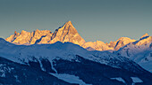 The Grandes Jorasses are in the light of a winter sunrise, Aosta Valley
